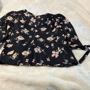 Floral silk blouse with tie detail at sleeves